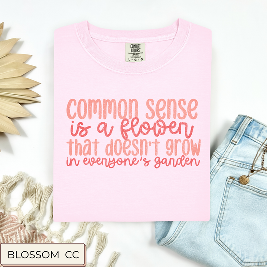 Common Sense Is A Flower Tee.