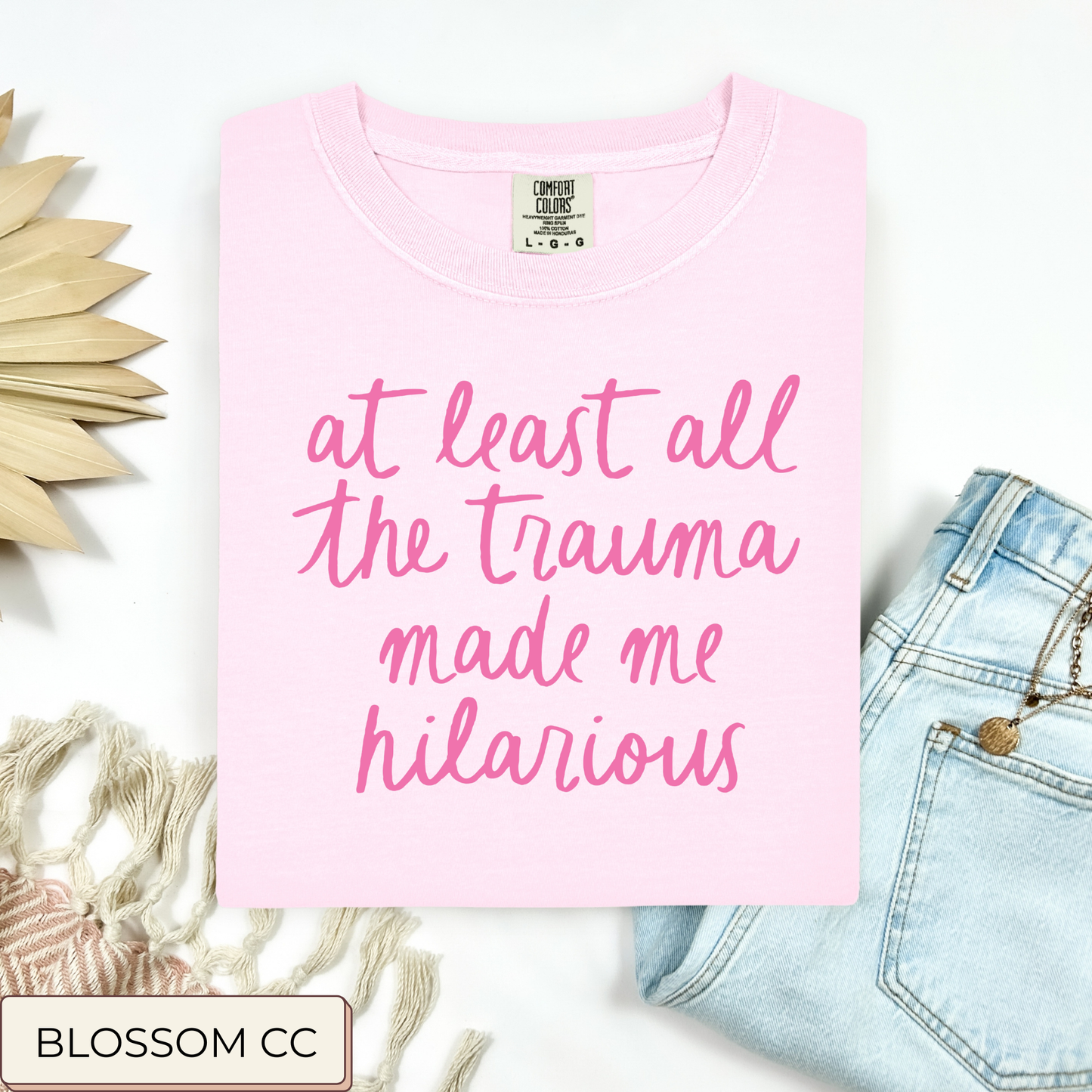 Trauma Made Me Hilarious Tee.
